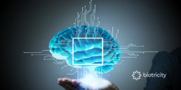 Man holding up an artificial intelligence brain image.